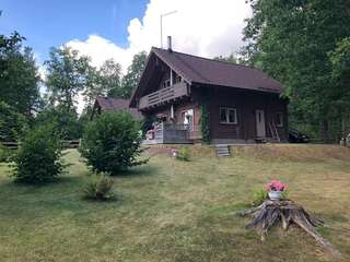 Дома для отпуска Деревянный дом с сауной и камином у леса, озера и СПА Отепя-0